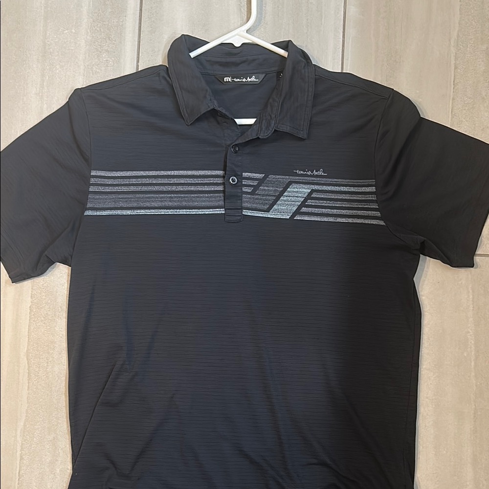 Travis Mathew Black Polo with Geometric Stripe Design